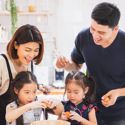 Asian American Family In Kitchen