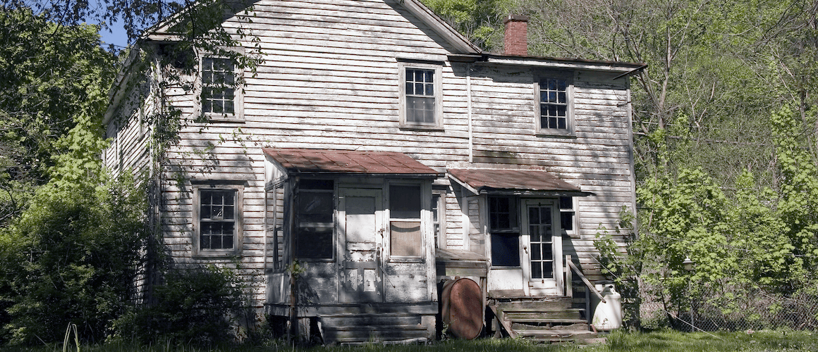 Run-down house in a suburban-rural area for flipping.