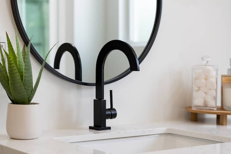 RHB Assets From IGX: Modern vessel sink bathroom with black faucet