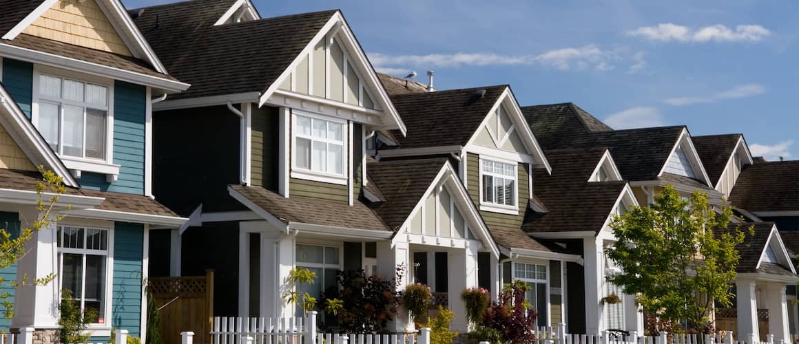 Row of colorful new townhomes.