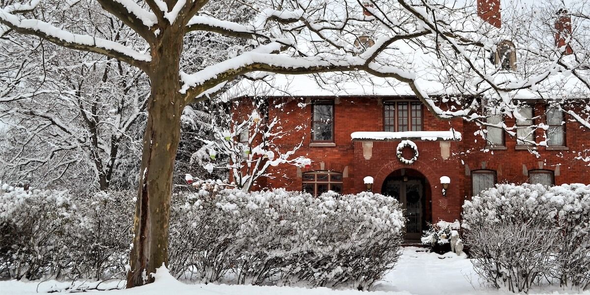 RHB Assets From IGX: Snow-covered house with icicles hanging from the roof