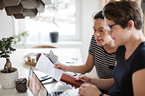 Couple reviewing their finances together.
