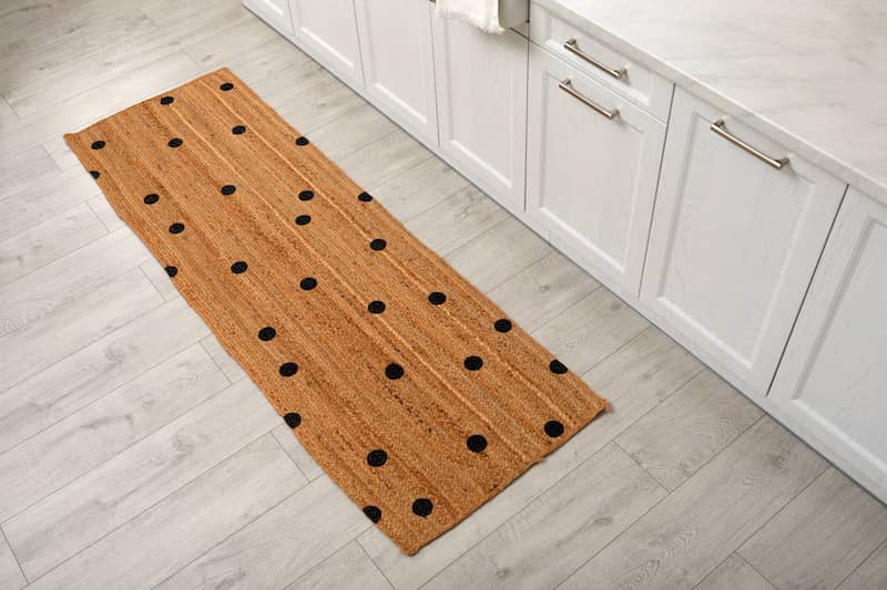 RHB Assets From IGX: Rental kitchen makeover with a stylish rug on the floor.