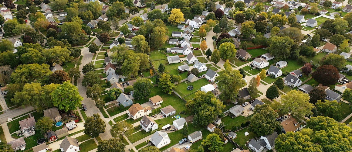 Prospective homebuyers reviewing a list of house buying questions