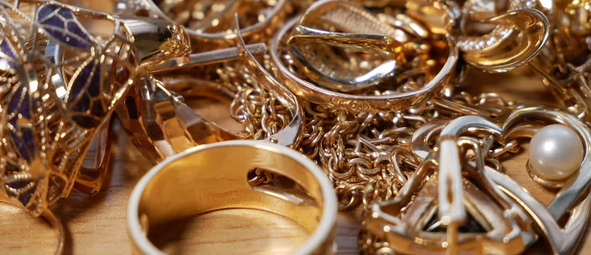 Pile of miscellaneous gold jewelry.