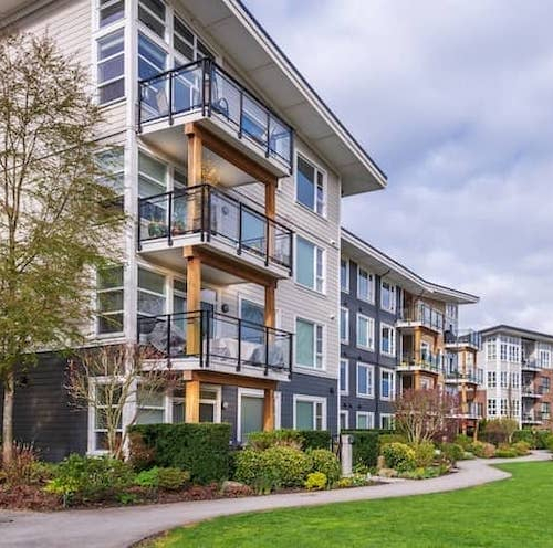A condo complex with HOA, indicating community living and homeowners' association in real estate.