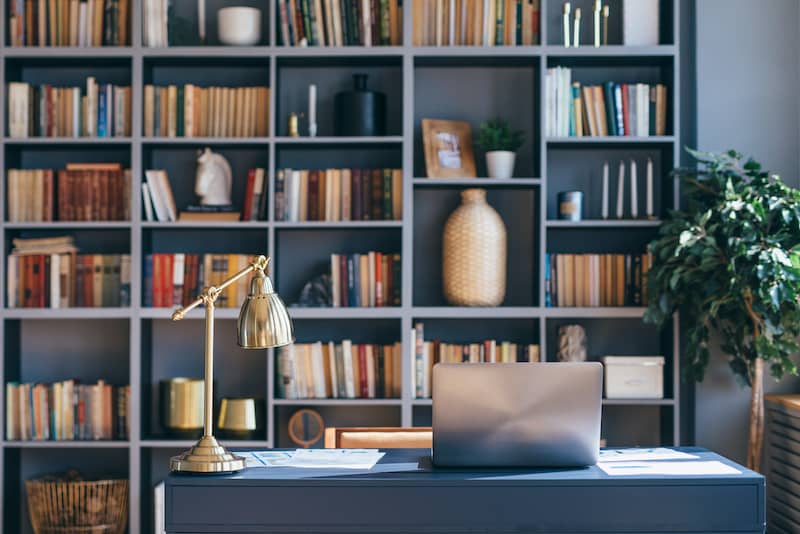 Home office with library.