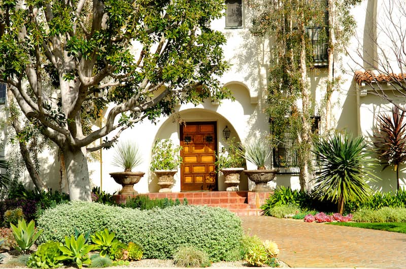 RHB Assets From IGX: Ornate Spanish-style front door with wrought iron accents.