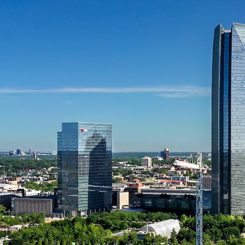 Oklahoma City cityscape with a few skyscrapers on a clear sunny day.