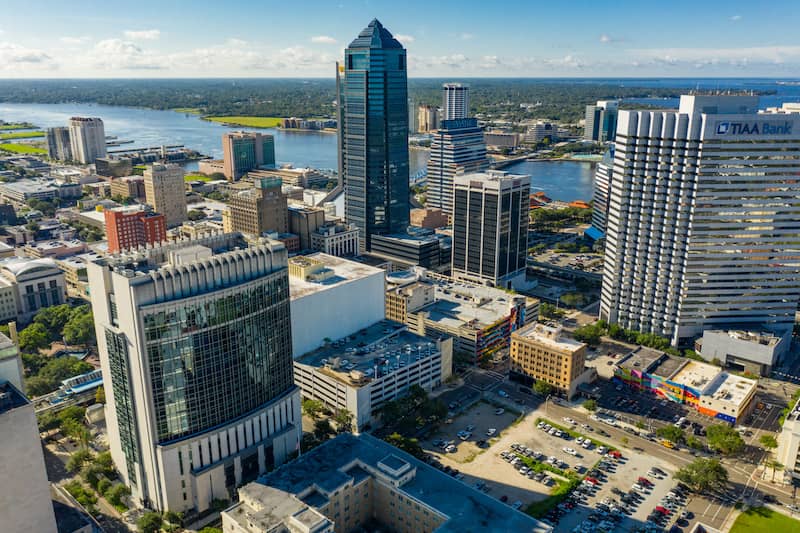 RHB Assets From IGX: Jacksonville, Florida skyline featuring prominent buildings and a beautiful waterfront.