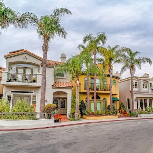 Beautiful two-story homes on a winding California street. 