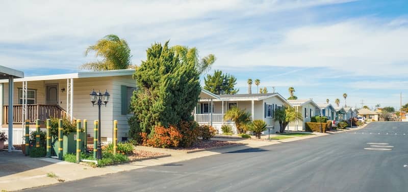 Image of manufactured homes on foundations in a row.