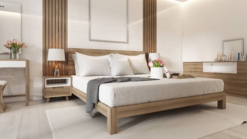 RHB Assets From IGX: A large guest bedroom with a comfortable bed.