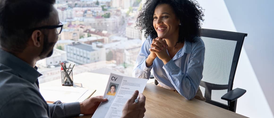 female African American applicant manager sitting in contemporary office