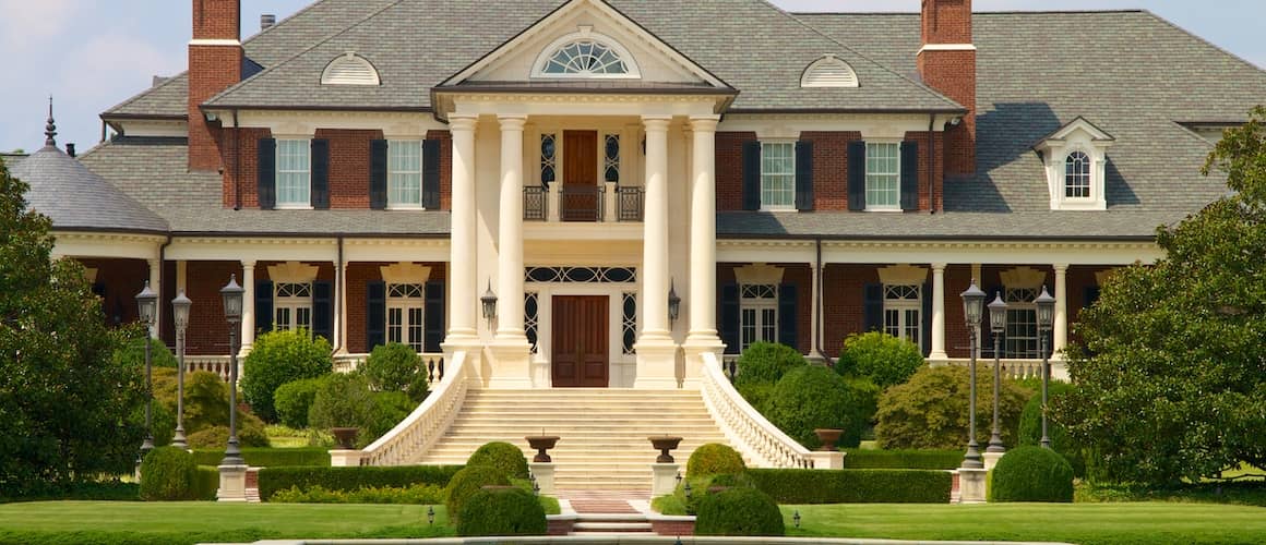 Rose Hill Estate, a 40 million dollar mansion in Georgia, with a grand staircase leading up to the front door.