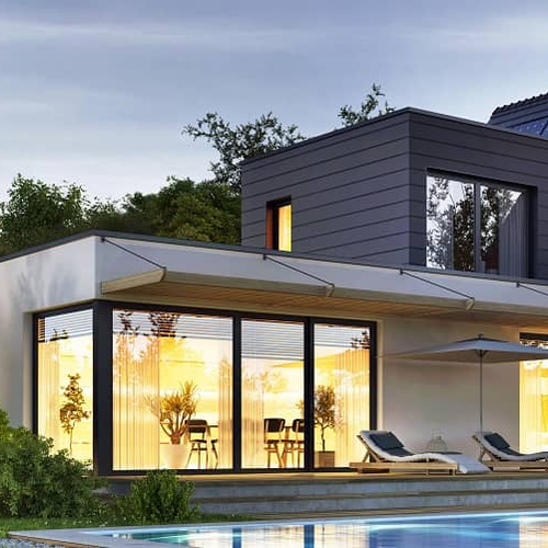 A modern house in twilight, showcasing the architectural design of a modern residence.