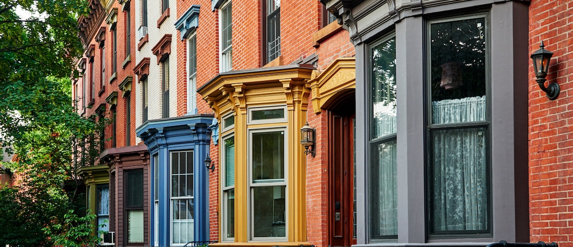 Colorful apartments in an urban city, depicting vibrant and colorful urban apartments.