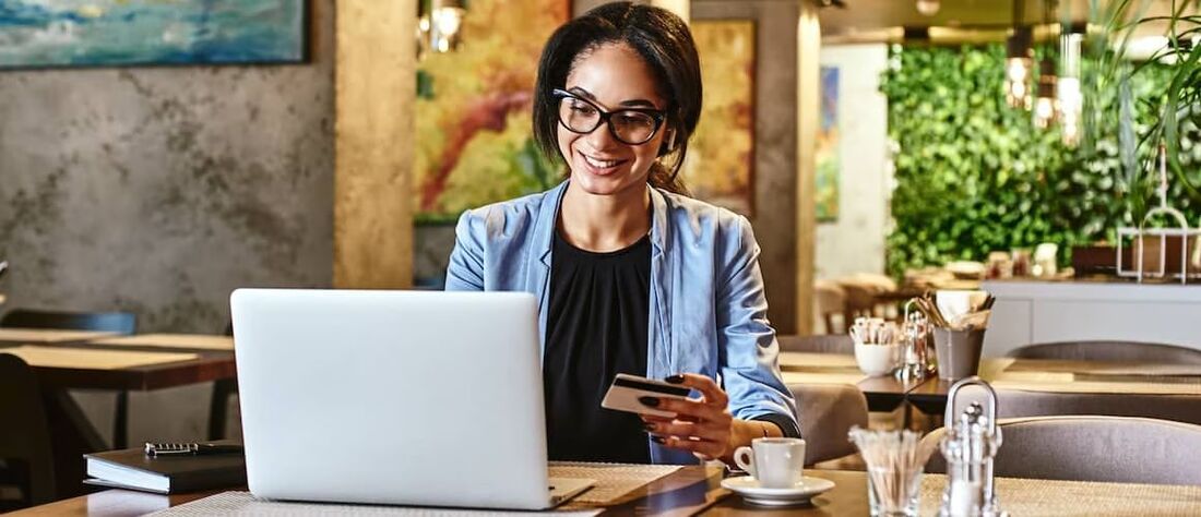 Woman checking her credit card.