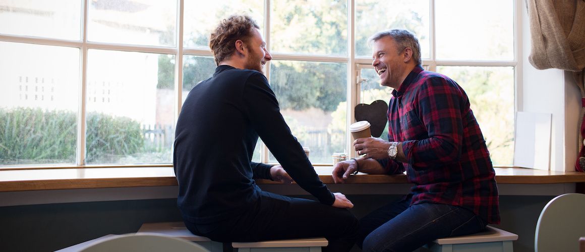 Stock-Male-Friends-At-Coffee-Shop.jpg