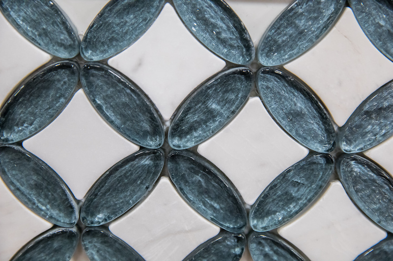 Blue and white penny glass tiles for backsplash.