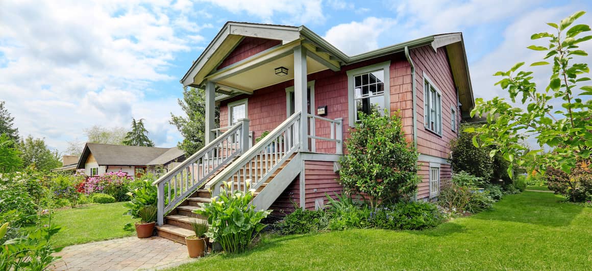 Lovely house with a porch and stairs, ideal for a peaceful and relaxing lifestyle potentially indicating good real estate investment.