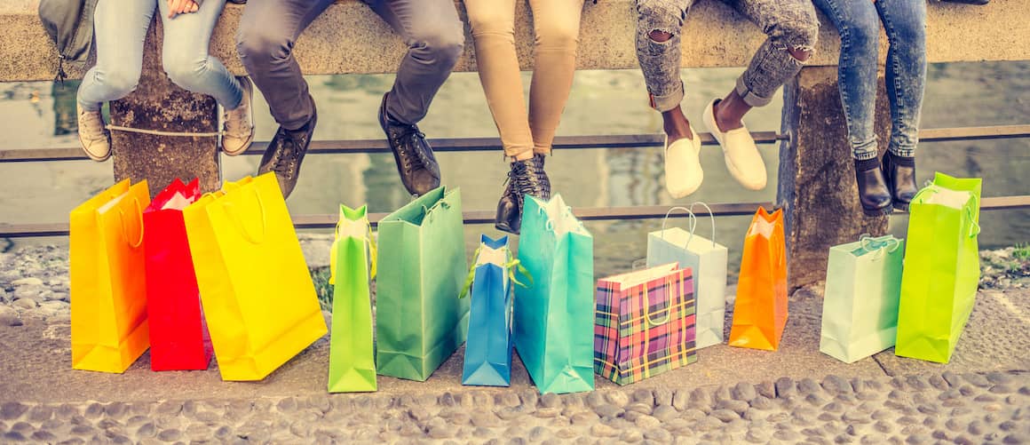 Row of colorful shopping bags.