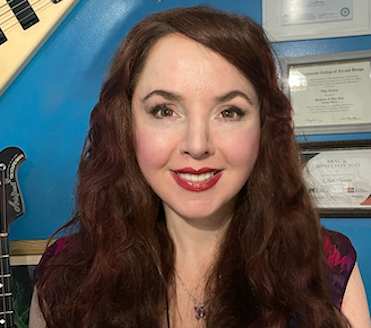 Olya Kenney headshot.