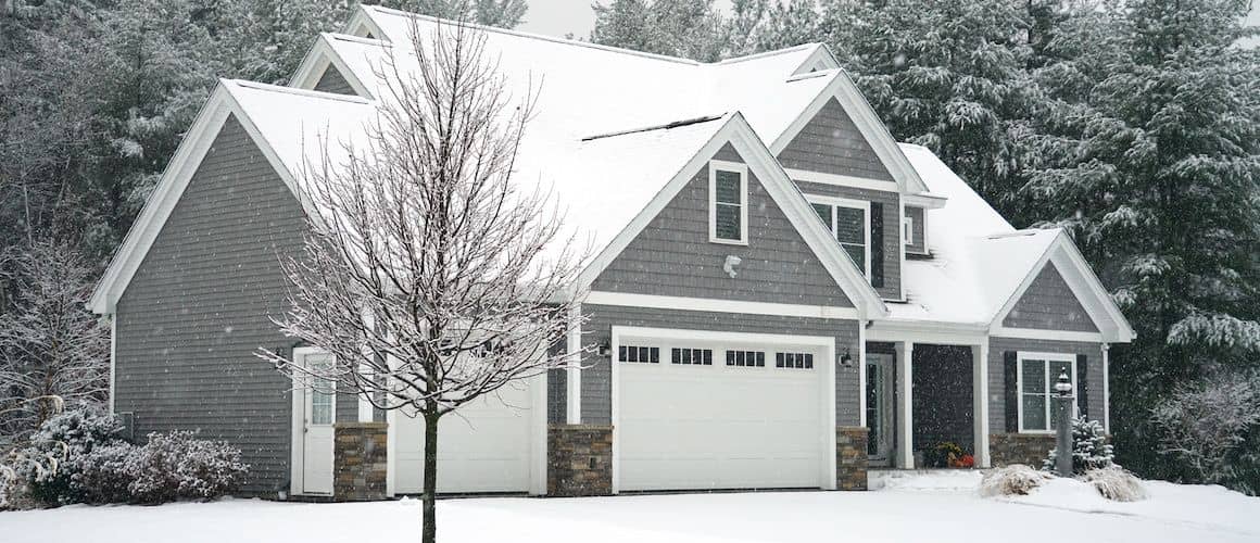 A large house in winter, showcasing a spacious residential property during the winter season.