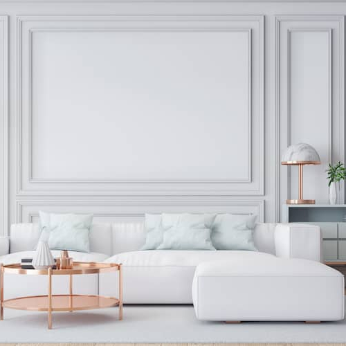 A clean white lounge with furniture depicting modern living rooms.