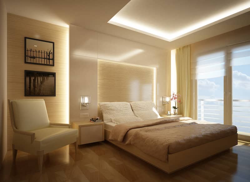 RHB Assets From IGX: Elegant primary bedroom with a unique ceiling design and luxurious furnishings.