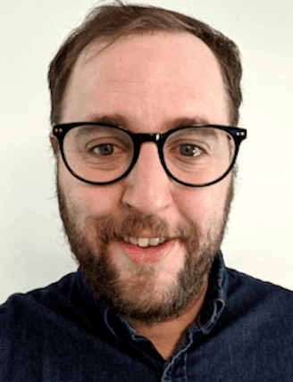Andrew Dehan headshot.