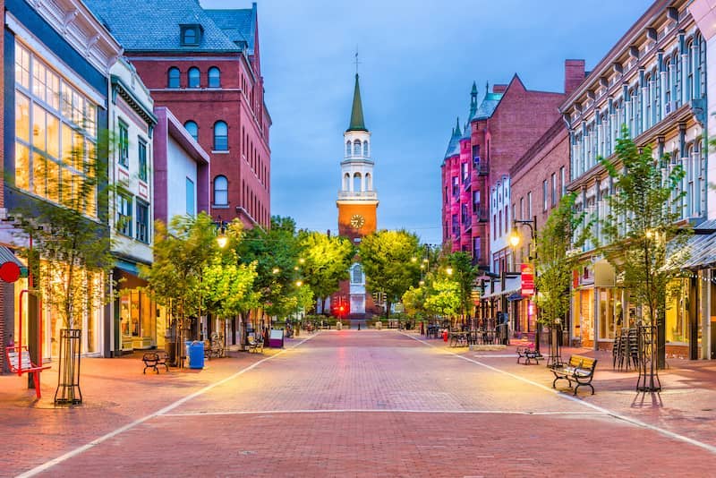 Street view of downtown Burlington at dusk.