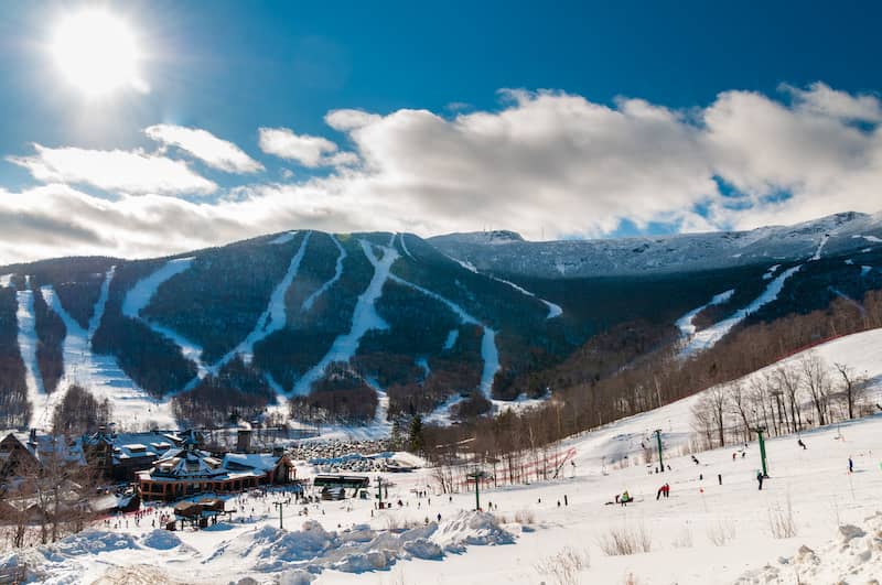 RHB Assets From IGX: Idyllic landscape of Stowe, Vermont with a mountain backdrop and fall foliage.