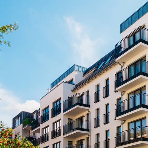 A modern apartment building in an urban area.