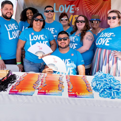 Group of employees at a pride event.
