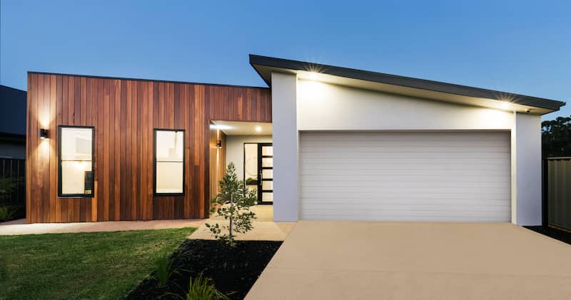 Contemporary home at dusk.