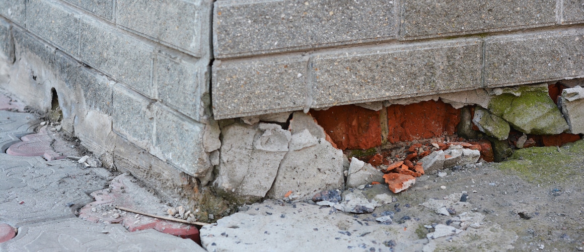 An image showing a broken foundation of a house, highlighting structural issues or concerns in a property.