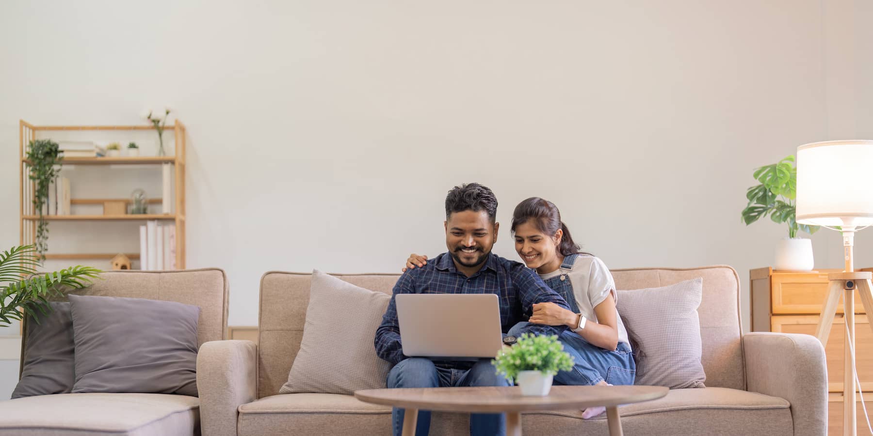 Indian Family Using Laptop