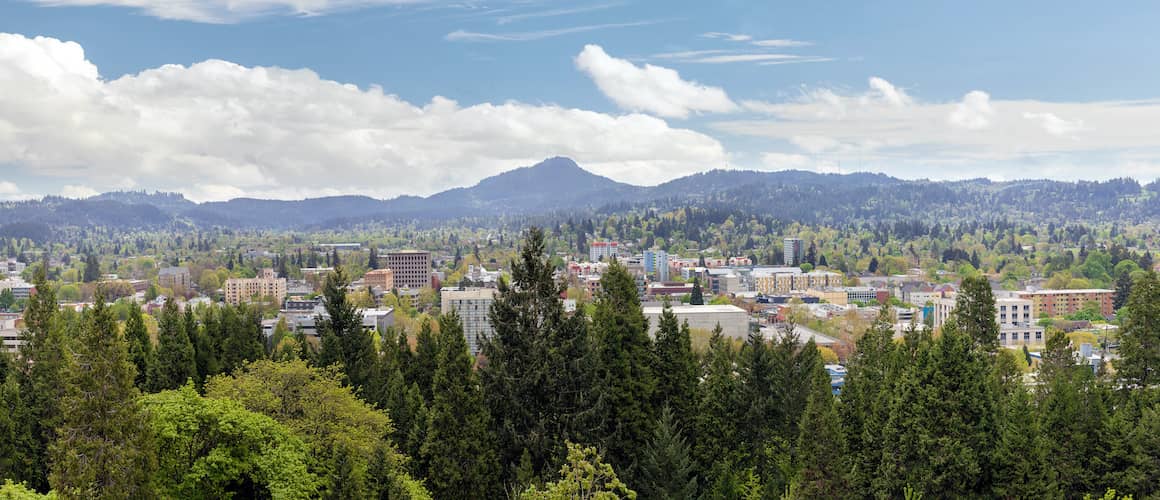 RHB Assets From IGX: Hiker on a trail with a beautiful mountain view