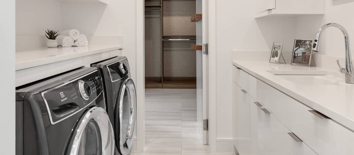 RHB Assets From IGX: Bright and clean laundry room with washing machine and dryer