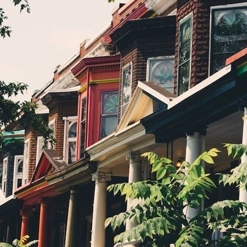 A mature couple using a laptop at home.