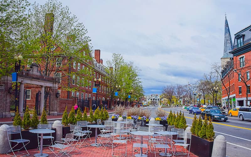 RHB Assets From IGX: Cambridge, Massachusetts street view with historic architecture and tree-lined sidewalks.