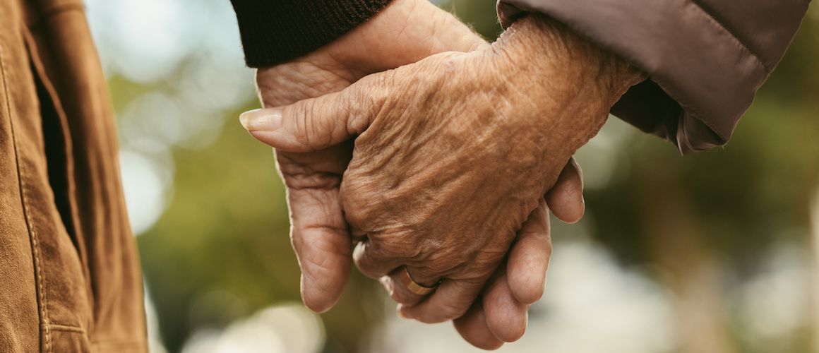 Stock-Older-Couple-Holding-Hands-Adobe-Stock-216277978-copy-compressor.jpeg