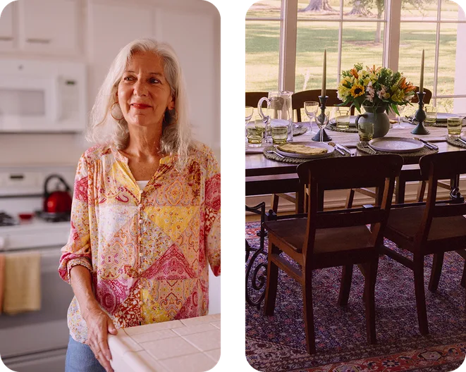 Older woman standing in a bright kitchen, smiling and looking off to the side