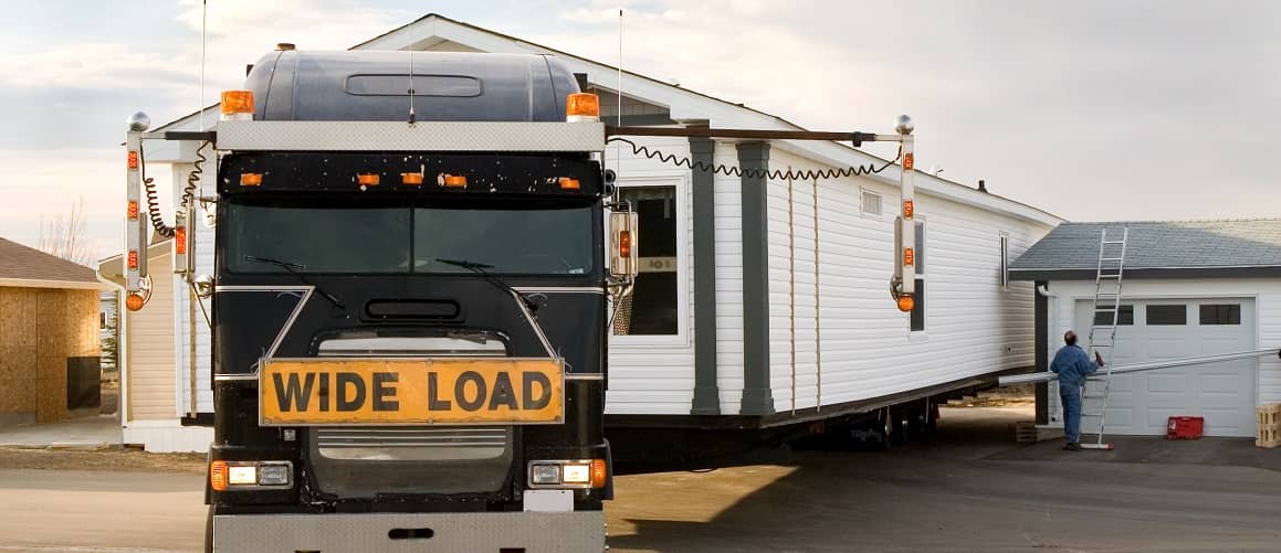 RHB Assets From IGX: A house being pulled by a truck, representing relocation.