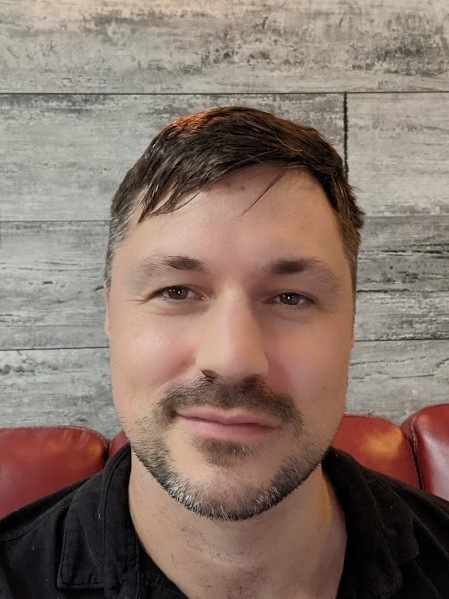 Portrait of Ben Giroux.
