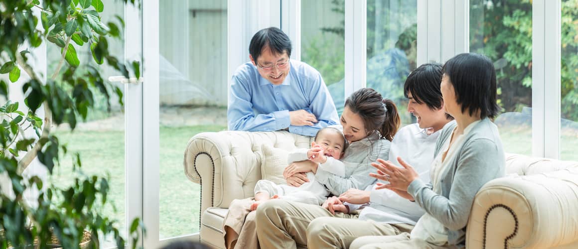 RHB Assets From IGX: A multigenerational family on a couch