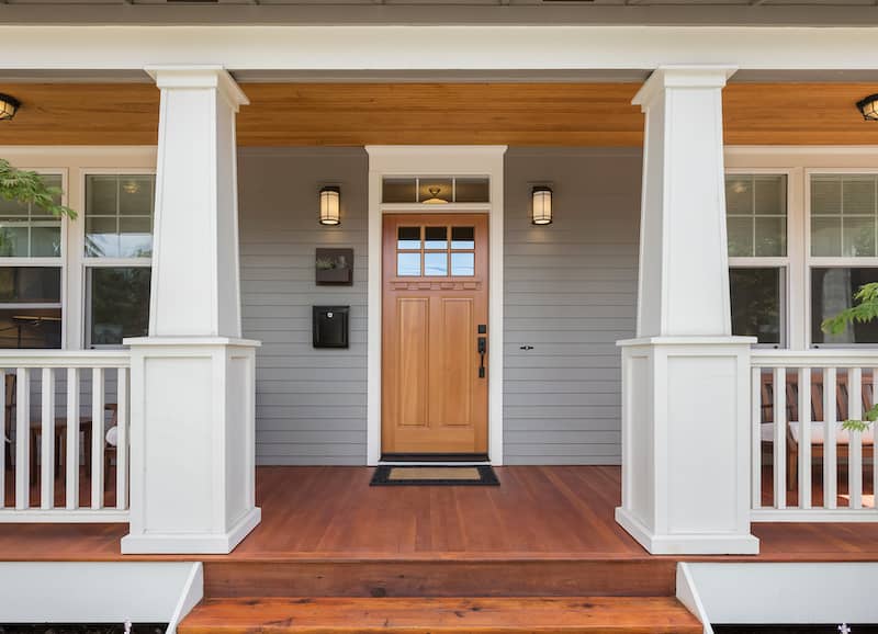 RHB Assets From IGX: A craftsman-style front door with elegant glass panels and a wooden frame.