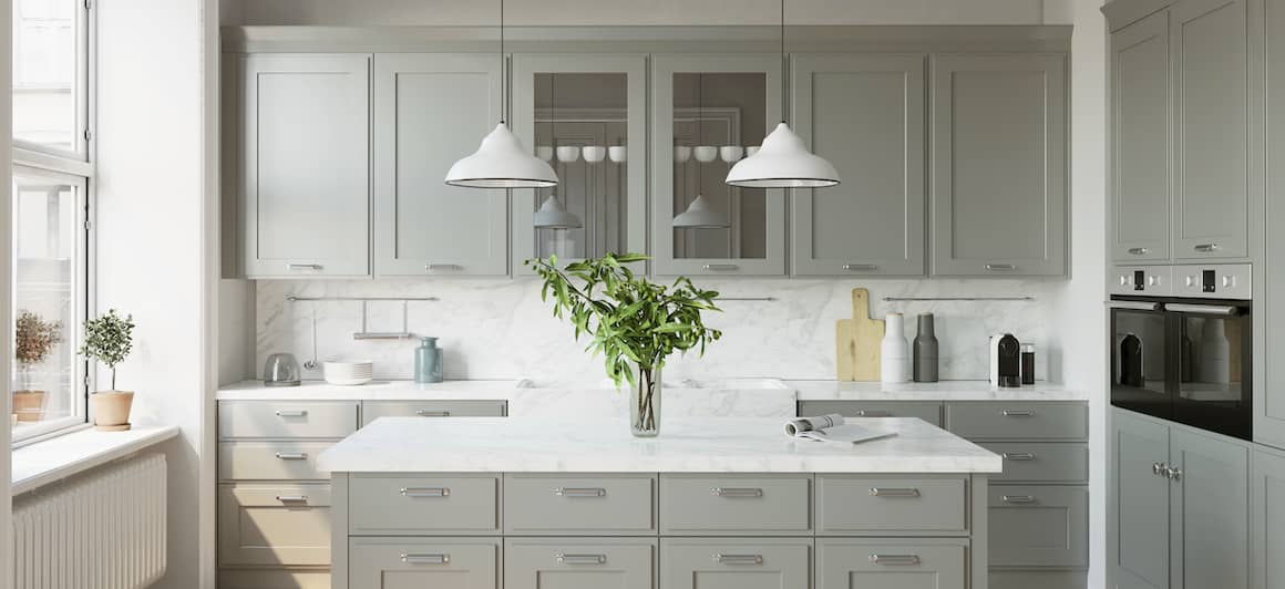 RHB Assets From IGX: Elegant Scandinavian kitchen with white cabinets, marble countertops, and a stylish backsplash.