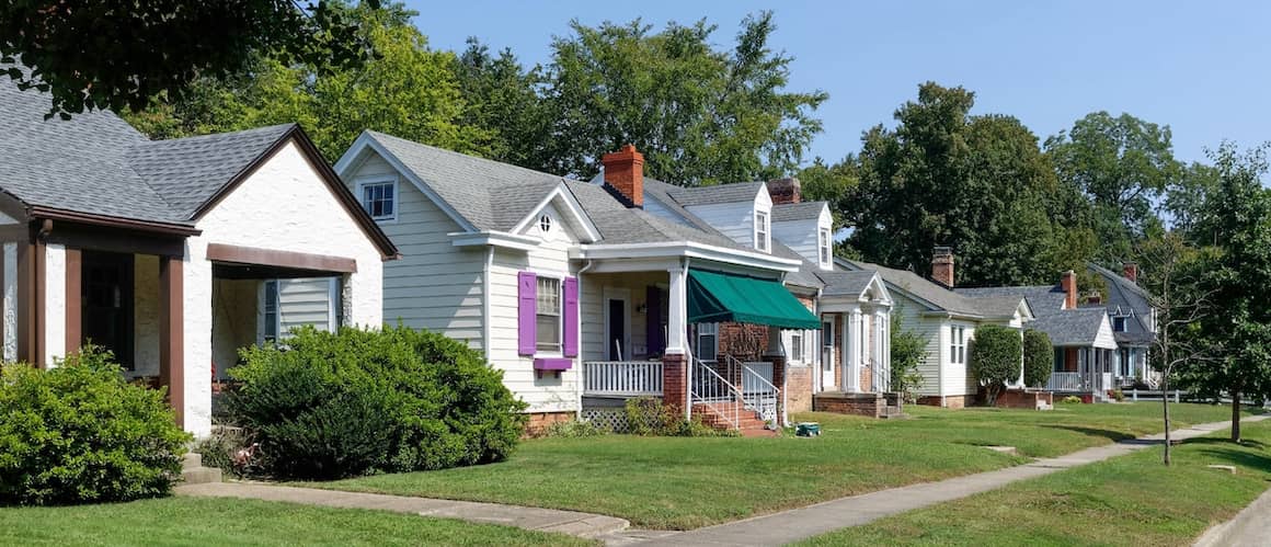 A row of bungalows, illustrating a series of single-story residential homes or a housing complex.